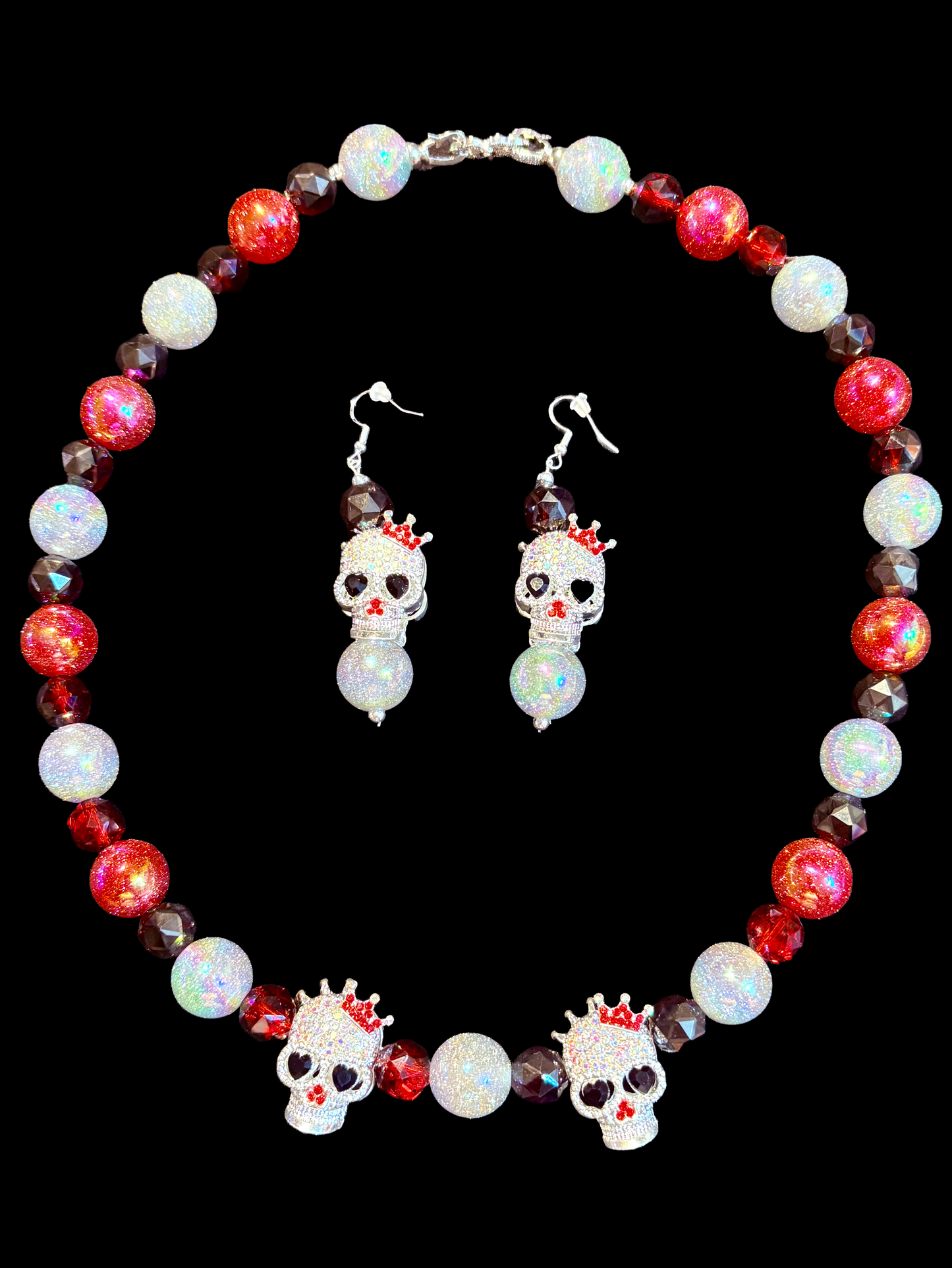 “Skulls, crowns, and fire-red power — this set is deadly glam. 💀👑🔥
