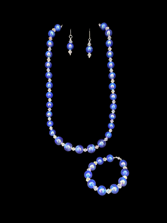 "Electric blue, crystal fire — this set doesn’t just make an entrance, it owns the room. 💙 #BigBeadEnergy"