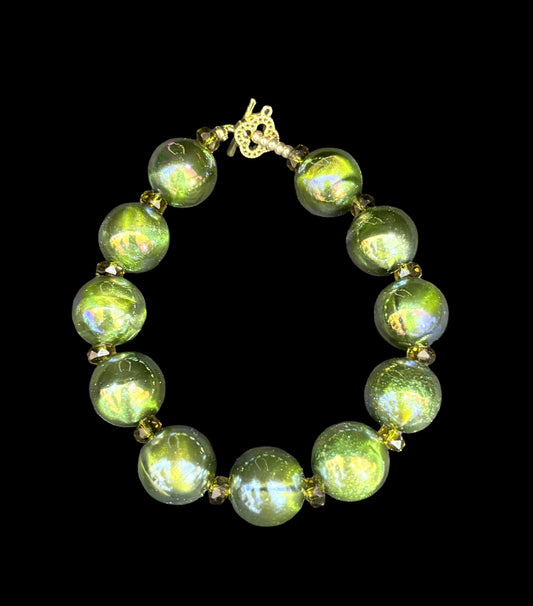 "Go big, go bold, go green — these beads don’t blend in, they take over. 💚 #BigBeadEnergy"