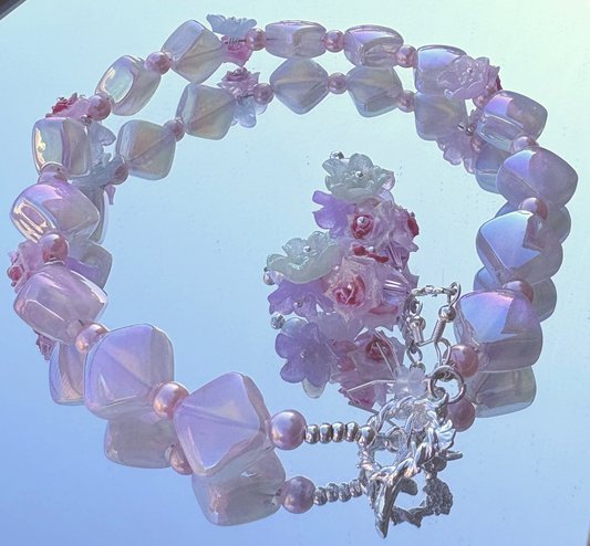 "Delicate flowers, fierce energy — this pastel set doesn’t whisper, it blooms with power. 🌸✨ #BigBeadEnergy"