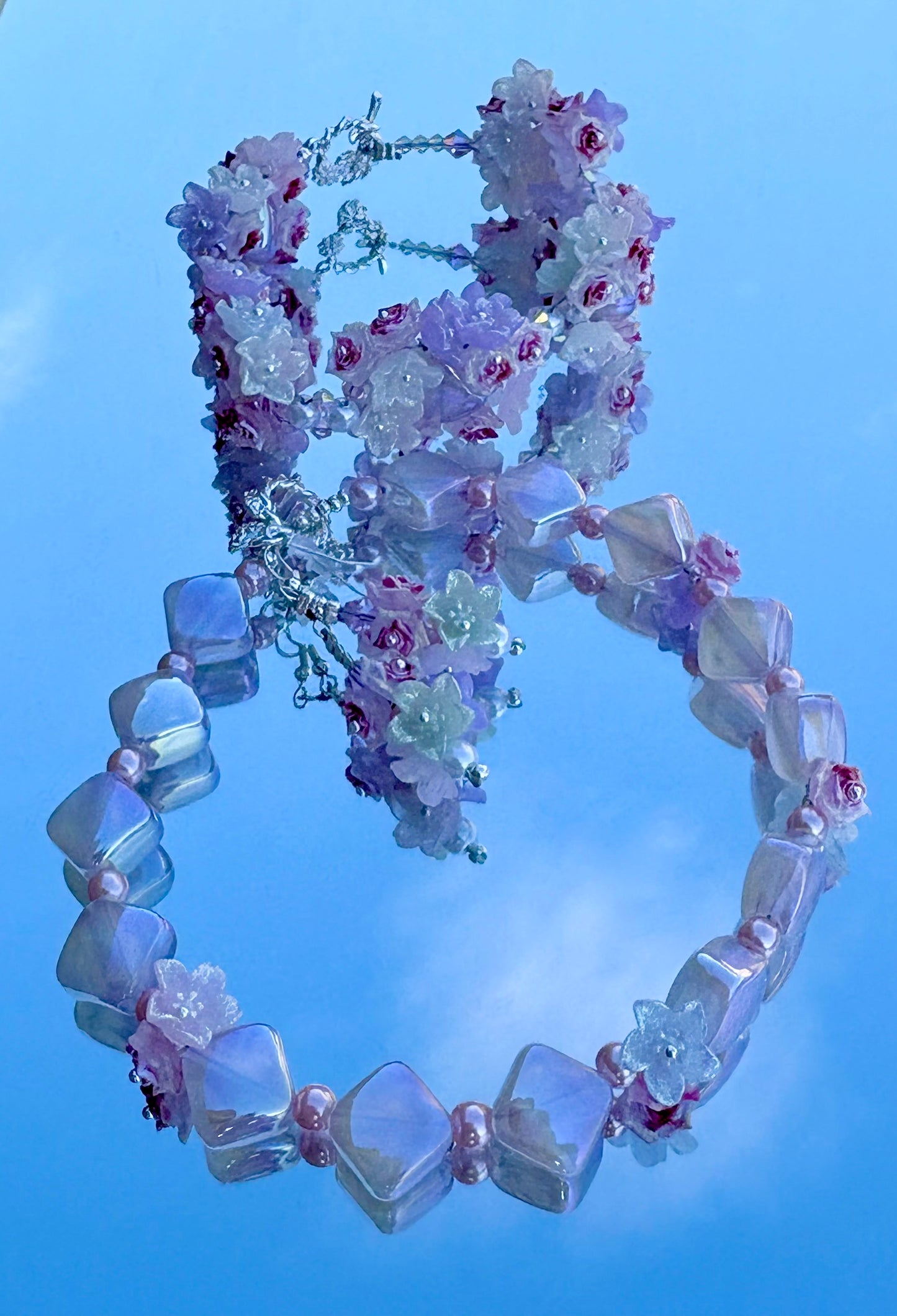 "Delicate flowers, fierce energy — this pastel set doesn’t whisper, it blooms with power. 🌸✨ #BigBeadEnergy"